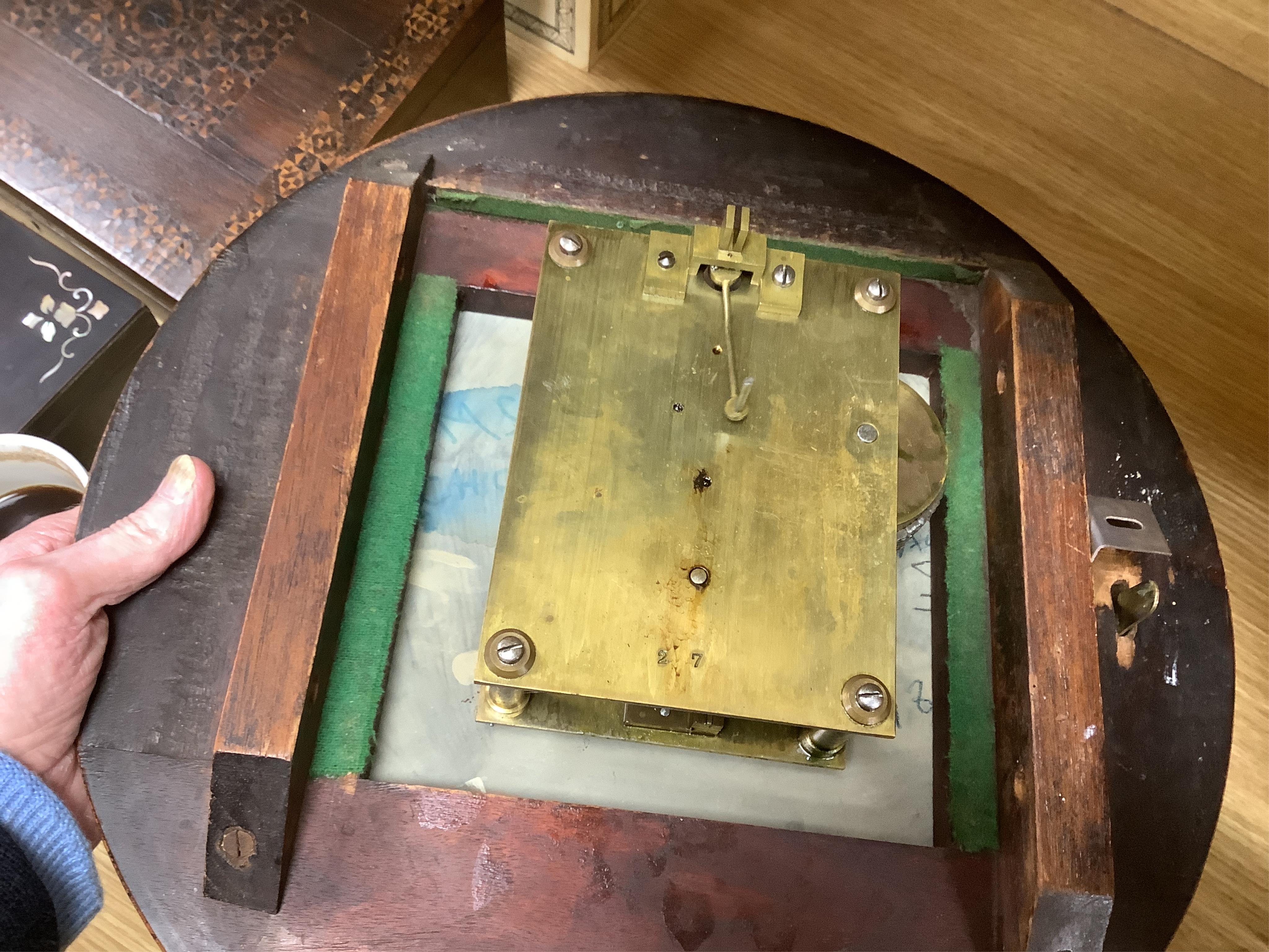 A circular dial mahogany cased wall clock with a single train fusee movement, painted dial reading Wilmshurst, Chichester, 39cm in diameter